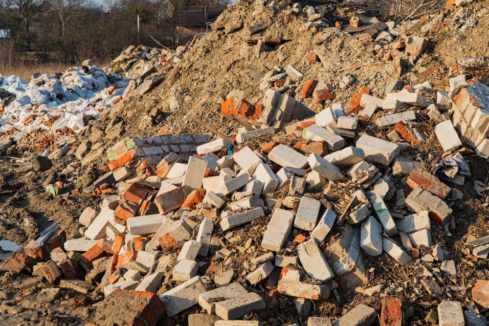 pile of construction debris requiring Construction Debris Services in Huntington Beach, CA