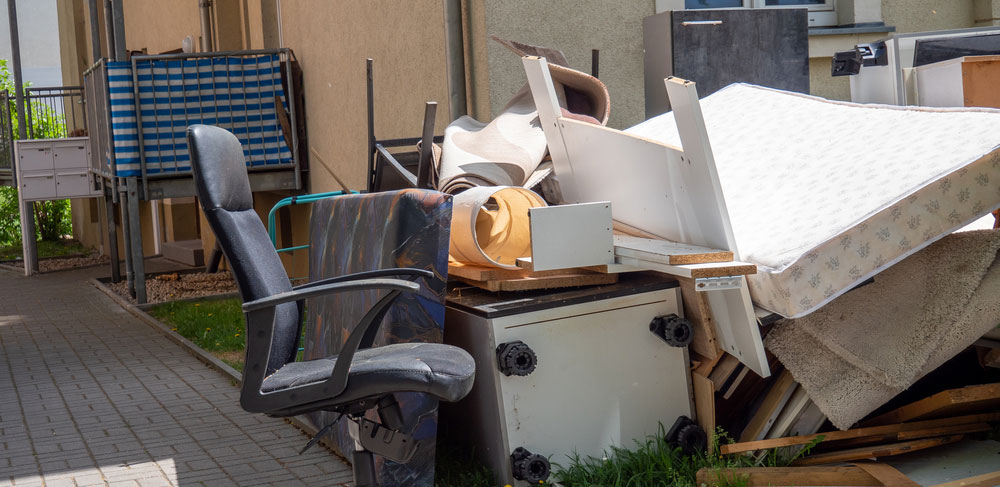 pile of furniture ready for Furniture Removal Services in Irvine, CA
