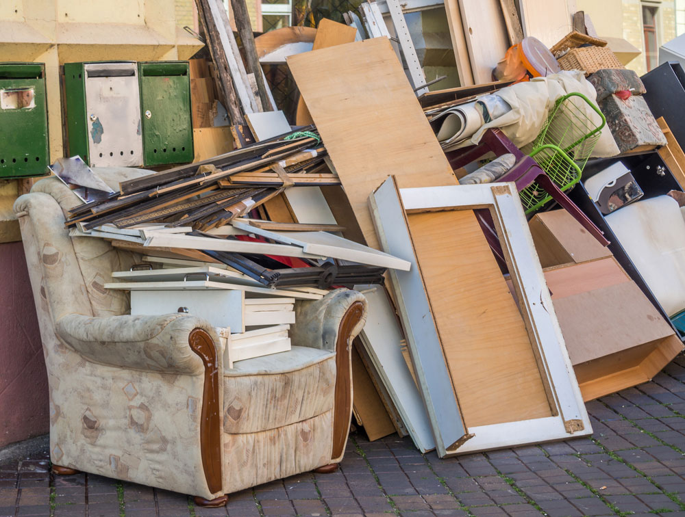 large pile of old furniture ready for Bulk Furniture Removal Services in Irvine, CA